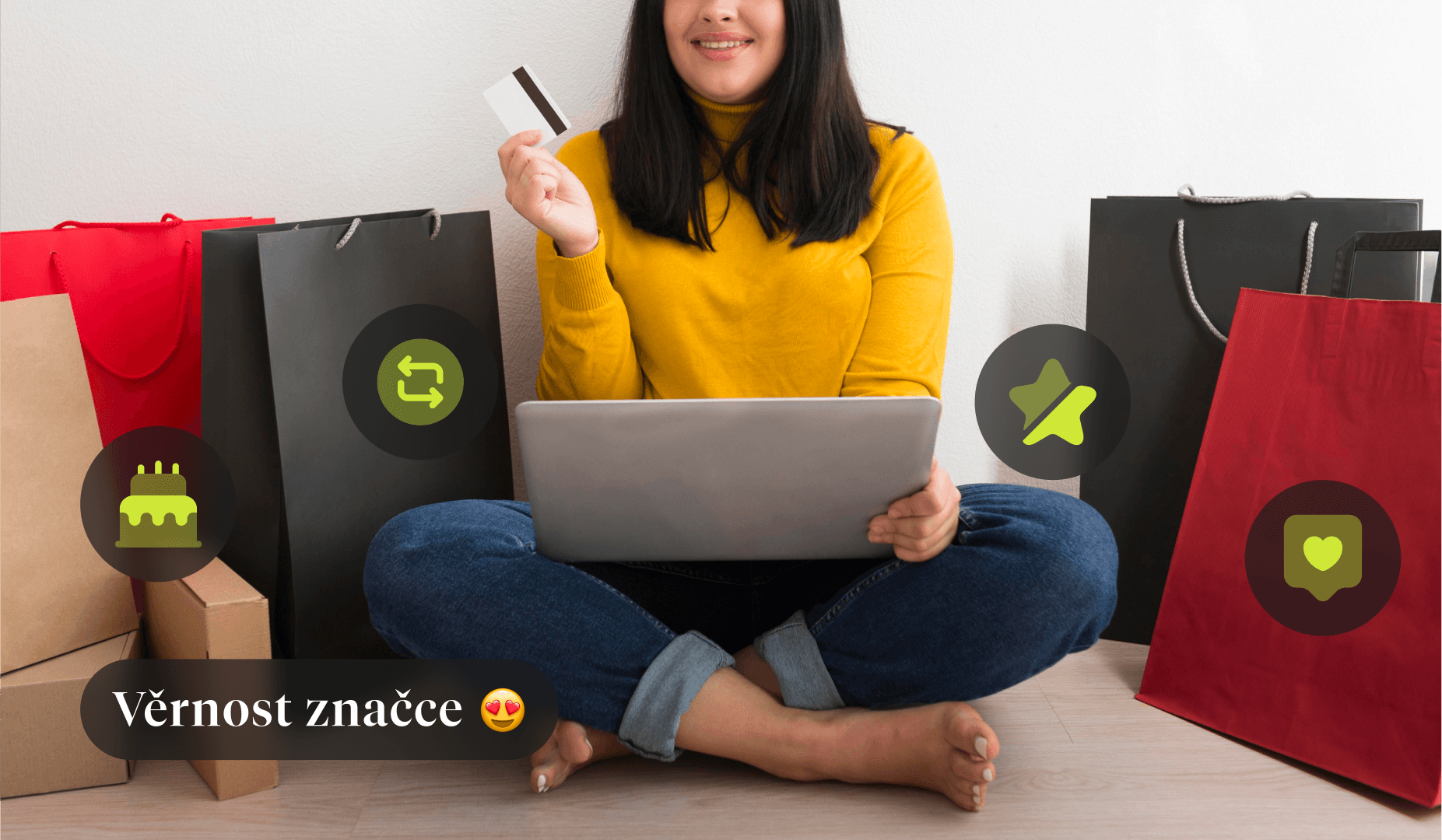 Žena s přenosným počítačem, sedící se zkříženýma nohama, obklopená výzkumnými taškami. Zobrazen je také text „Věrnost značce“.