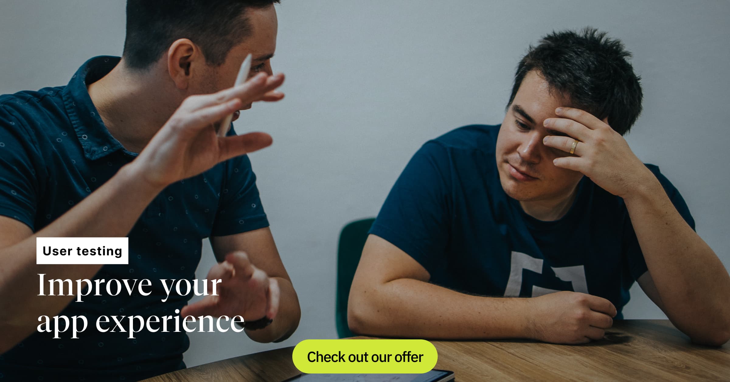 Two men, one explaining, the other listening, with a caption saying, "Improve your app experience."